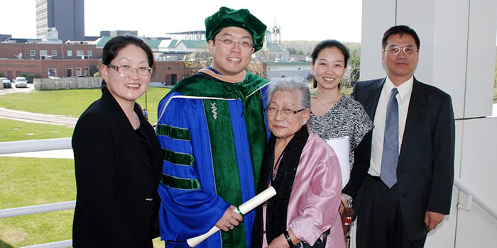 Dr. Christopher Chen celebrates medical school graduation with his family